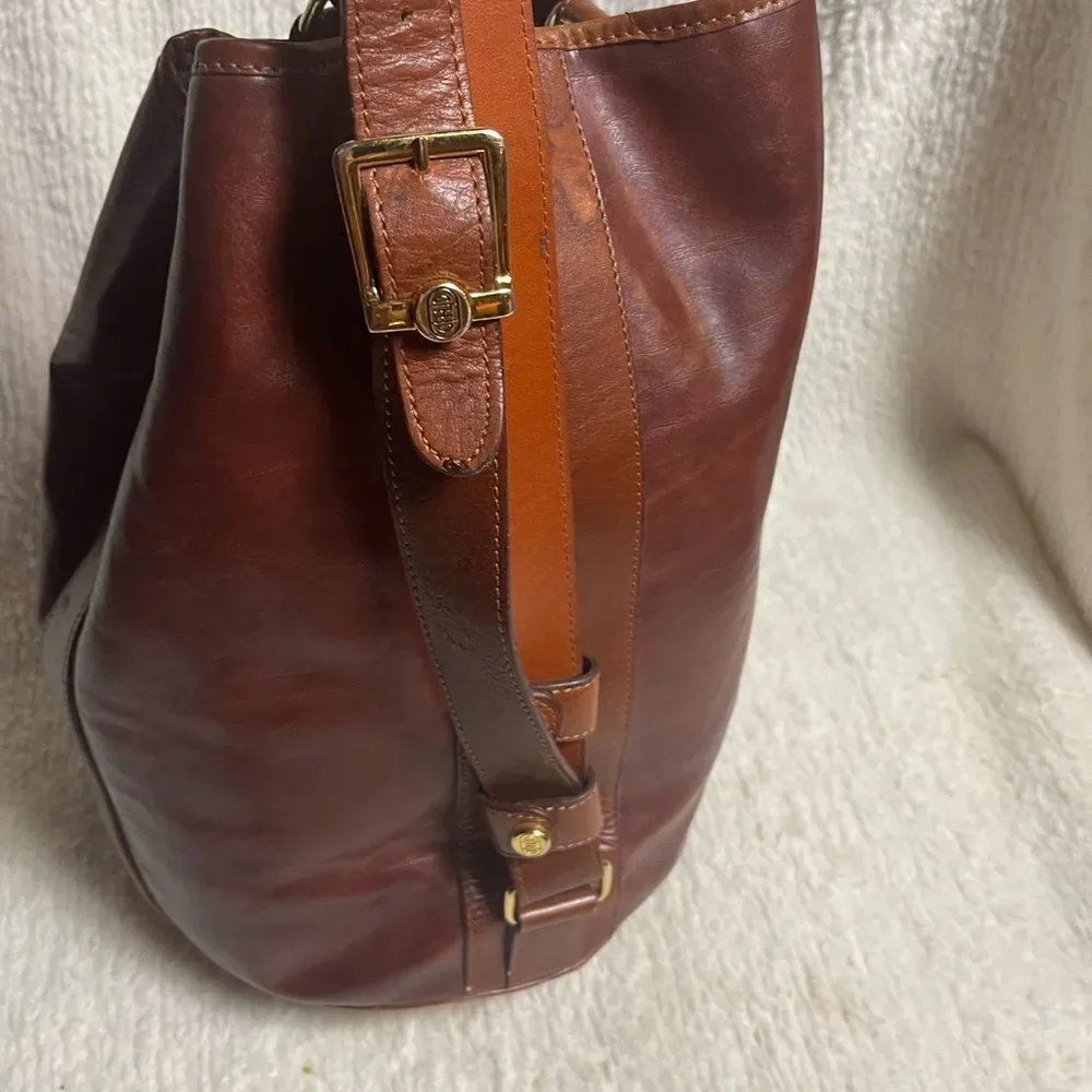 Fortune Duck vintage leather Brown sling back bucket style  bag.